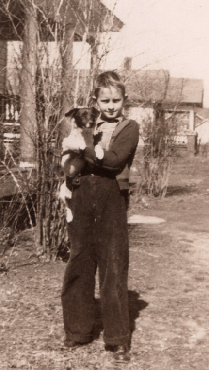 Louis Grady Threadgill holding small dog